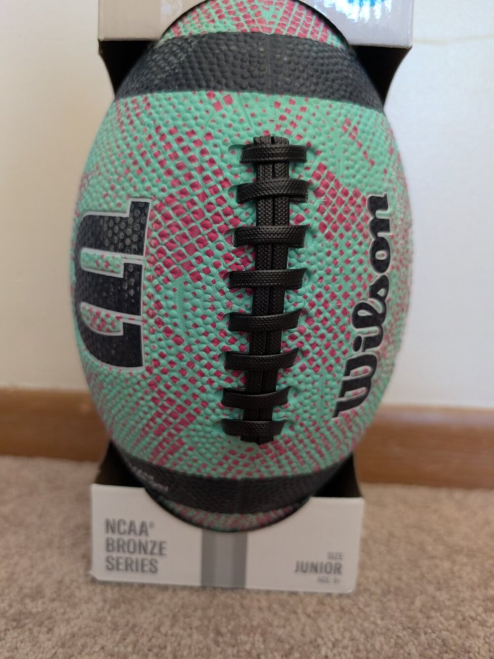 New in box NCAA bronze series junior Wilson football teal pink blue